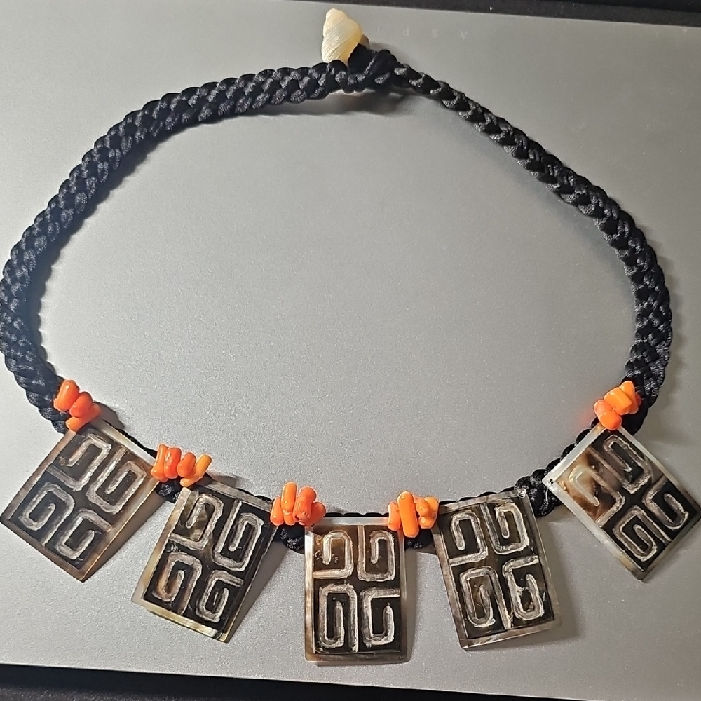 Elegant Black and Silver Necklace with Orange Accents